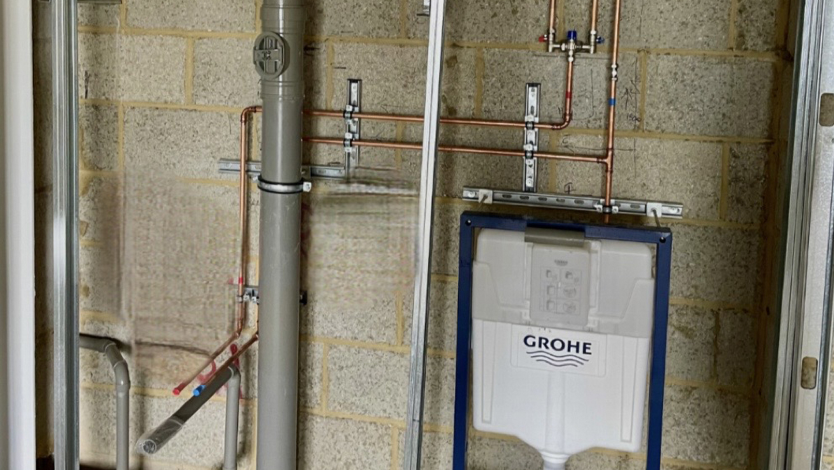 Pintec Group project: Above Ground Drainage for whistable care home - PVC downpipe and copper piping